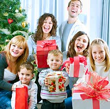 Happy family celebrating Christmas.Gifts