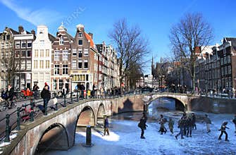 Skating near crossing two canals in Amsterdam