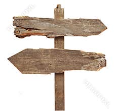 Old wooden arrows road sign