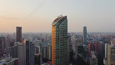Taikoo Hui Tower Glowing at Sunset in Shanghai's Jing'an District