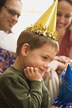 Boy at birthday party.