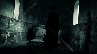 Horror scene of haunted woman in black dress