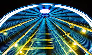 Ferris wheel in motion during night