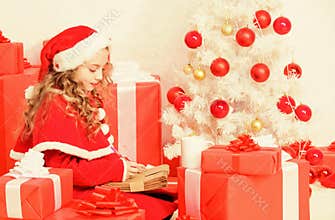 Christmas and new year holiday. Writing letter to santa claus. Winter tradition. Kid cute girl writing email letter on