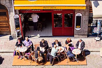 Typically French, enjoy the sun and a drink on a terrace.