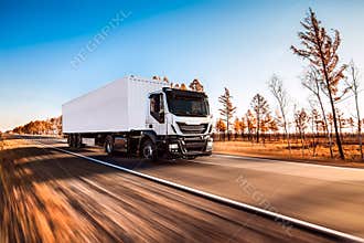 White truck with white trailer on the road