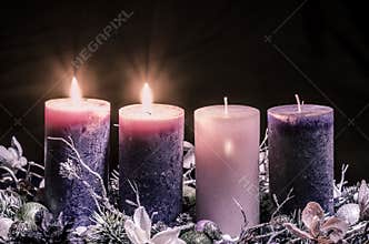 Advent decoration with two burning candles