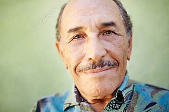 Aged latino man smiling at camera