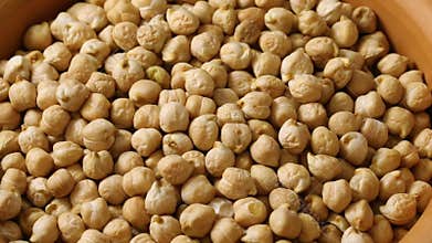 Bowl with dried chickpeas close up full frame