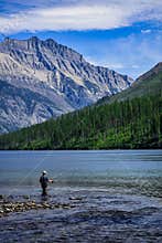 Man Fly Fishing in Kintla Lake