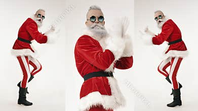 Energetic fun active Santa dances on modern celebration of New Year, Christmas