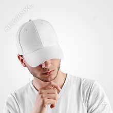 Mockup of a white baseball cap on a guy with his head down, front view, for presentation of design, pattern