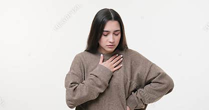 Shocked woman covering face in fear and sighing in relief