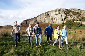 Young adults on country walk