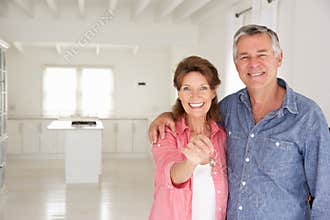 Senior couple in new home
