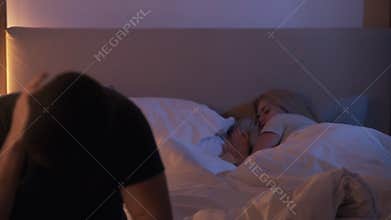 sleep disorder night anxiety pensive man bed woman