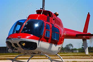 Bell 206 helicopter taking off