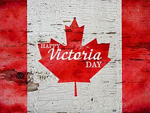 Victoria Day lettering on the background of the Canadian Flag