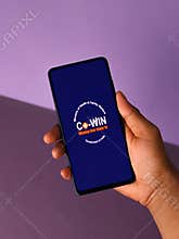 Assam, india - March 10, 2021 : CoWIN app logo on phone screen stock image.