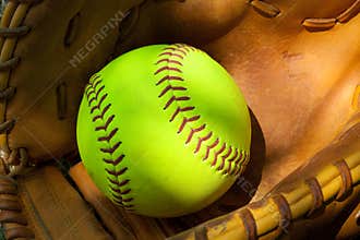 Softball and glove