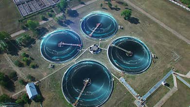 Drone aerial orbit view on water treatment with motion graphics.