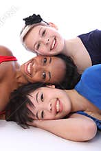 Mixed race happy girls tower of smiling faces