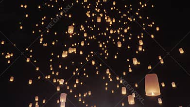 Tourist floating sky lanterns in Loy Krathong festival , Chiang Mai ,Thailand