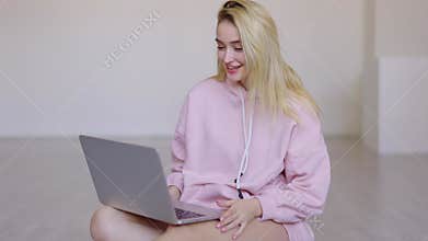Happy young woman making video call to friend