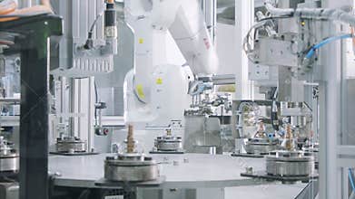 Advanced robotic machine manufacturing parts in an automated assembly line