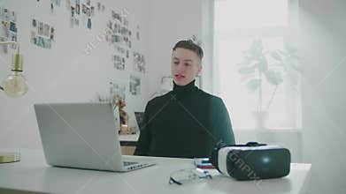 Cheerful student enjoys distant online school conversation