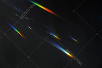 Light leak effect on a black background wallpaper