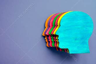 Small head with different colors as symbol of diversity and inclusion.