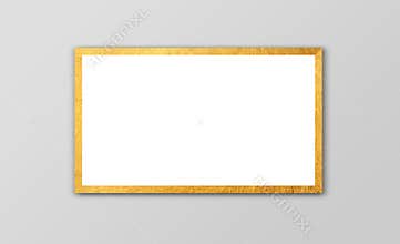 One Horizontal golden Picture frame. White Blank with gold Borders Hanging in Soft Grey Wall. 1 Foto Frame with golden Border.