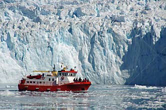 Cruise boat among the icebergs, Greenland