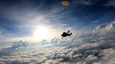 Tandem skydiving in a dramatic sky.