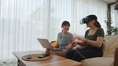 Granddaughter guide grandmother to dive in metaverse with VR. Divergence.