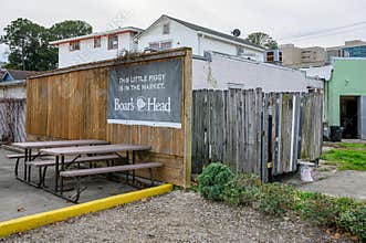 Boar\'s Head Banner on Wooden Fence
