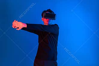 Smart sportman player wearing VR stretching whole body posing. Contrivance.