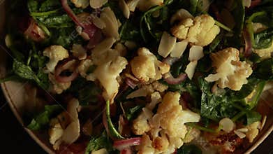 Warm Winter Salad with Cauliflower, Spinach, Red Onion, and Almonds - CloseUp