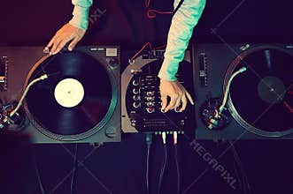 Dj using equipment