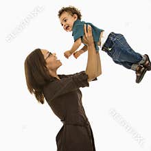 Mom playing with baby.