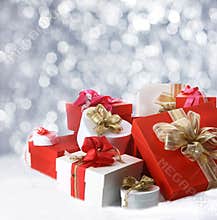 Christmas gifts against sparkling party lights