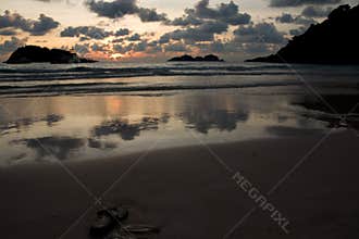 Sunset on the beach. Paradise beach.