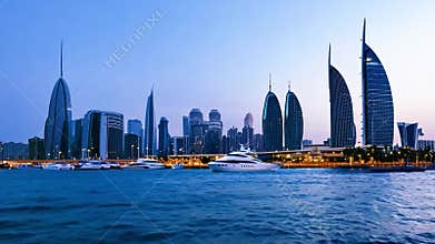 Skyline of bahrain financial harbor changing during twilight