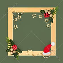 Christmas Santa Hat and Festive Symbols on Gold Background Frame