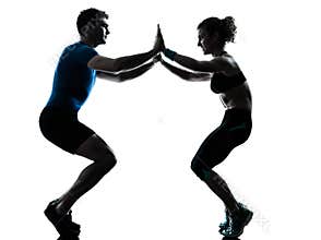 Man woman exercising squats workout fitness