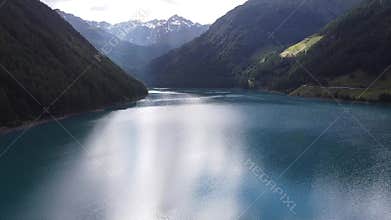 Lake Vernago reflecting the blue sky, Trentino Alto Adige, Italy