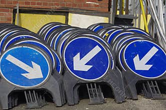 A Store of Circular Blue Road Warning Signs