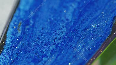 Glitter fluid spill sparkling paint cascade blue