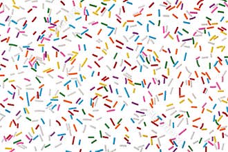 Colorful candy sprinkles isolated on white